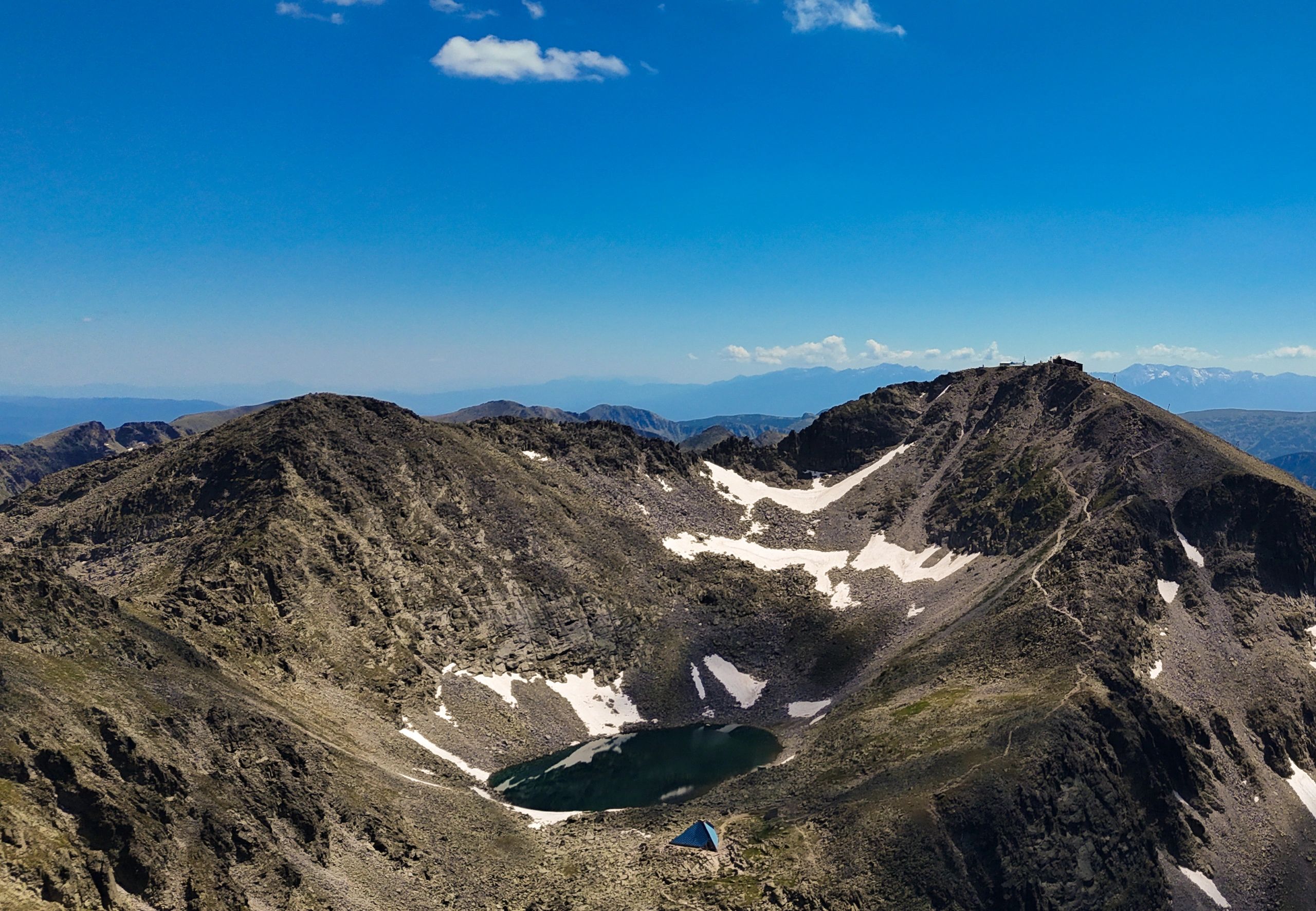 Tent in alpine landscape for testimonial card